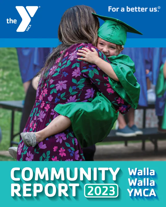 The cover page for the Walla Walla YMCA 2023 Community Report document shows a graduation preschooler in a green cap and gown joyfully hugging a teacher after jumping into her arms at an outdoor graduation ceremony.