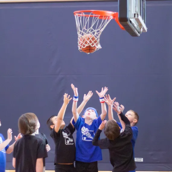 Boys playing basketball