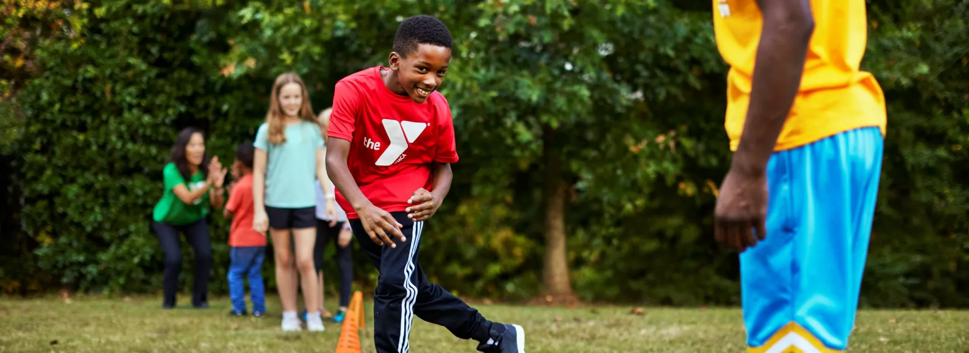 Boy playing in field.